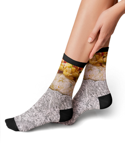 Lifestyle shot of a woman wearing Breakfast Burrito 360 socks.