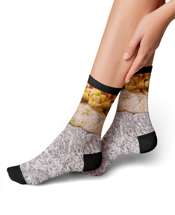 Lifestyle shot of a woman wearing Breakfast Burrito 360 socks.