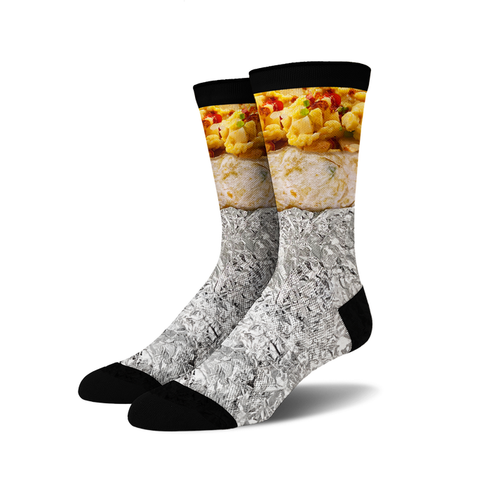 Pair of crew socks with a breakfast burrito design. The socks are primarily white, gray (foil), and feature yellows and browns of the burrito filling.