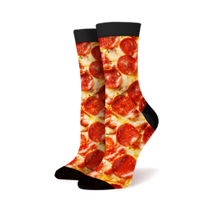 Lifestyle shot of a person wearing the pepperoni pizza socks.
