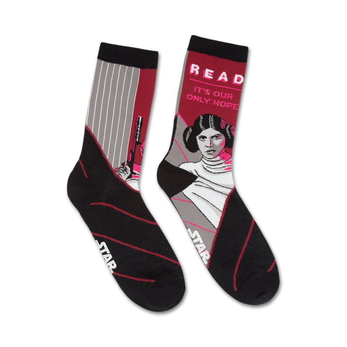 Pair of black crew socks. One sock features Princess Leia and the phrase 'Read. It's our only hope.' The other has gray and pink stripes and a blaster. }}