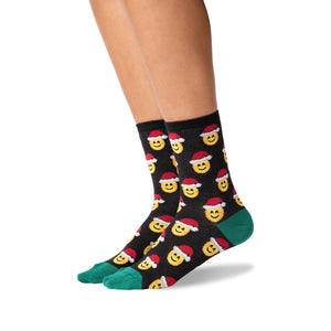 Lifestyle shot of a person wearing the Santa Smile Emoji socks. Shows how the socks look on the feet.