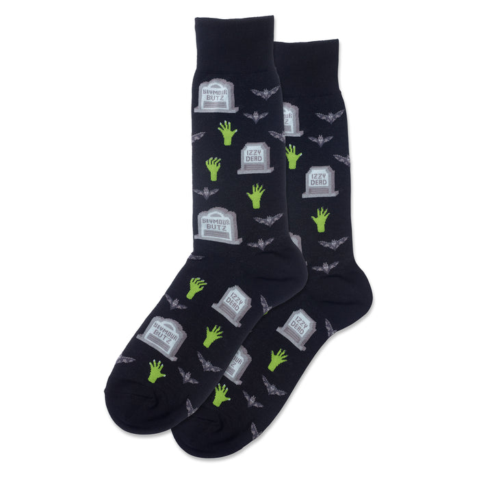 Pair of navy crew socks with a Halloween design. The pattern includes cartoon gravestones, zombie hands, and bats. }}