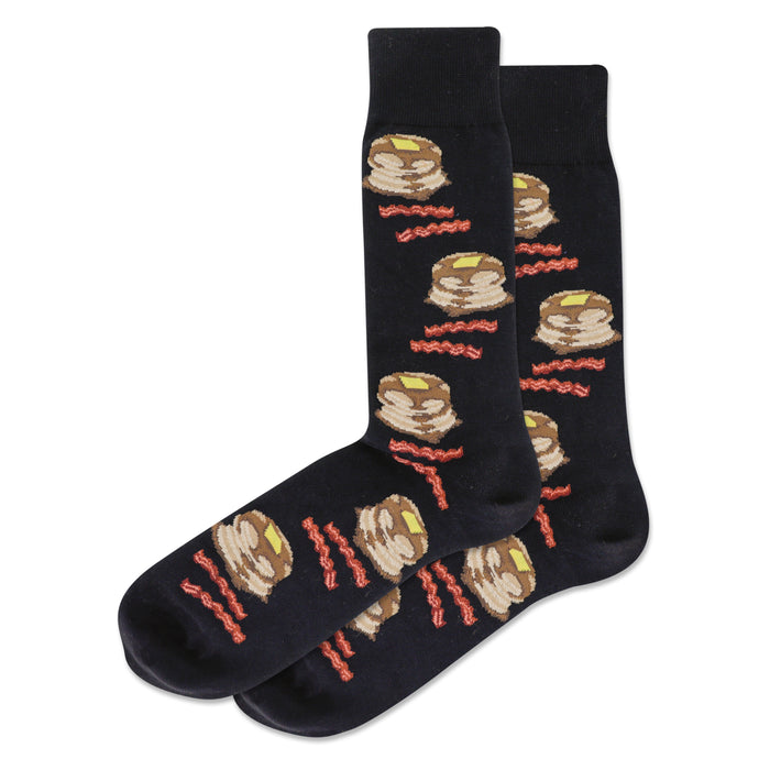Pair of dark crew socks with a repeating pattern of illustrated pancakes and bacon strips. Pancakes are light brown with yellow butter; bacon is reddish-brown. }}