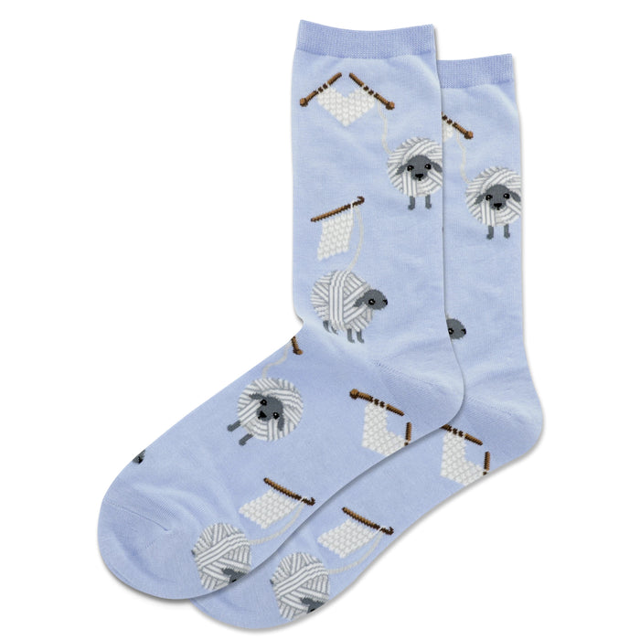 Pair of light blue crew socks with a repeating pattern of gray sheep tangled in yarn balls and knitting needles. }}