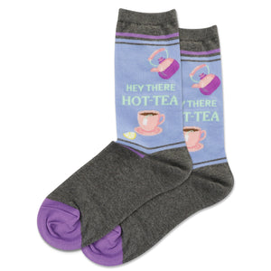 A pair of lavender 'Hey There HOT-TEA' socks with grey feet and purple toes. The design is similar to the main image but with a different color scheme.