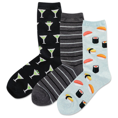 Three pairs of crew socks. One black pair features martini glasses, one grey pair has stripes, and one light blue pair shows sushi.