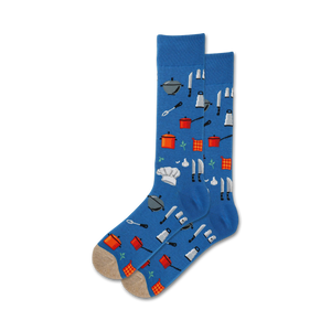 Pair of crew socks, blue and beige options shown, featuring a pattern of kitchen tools like pots, pans, knives, and a chef's hat.