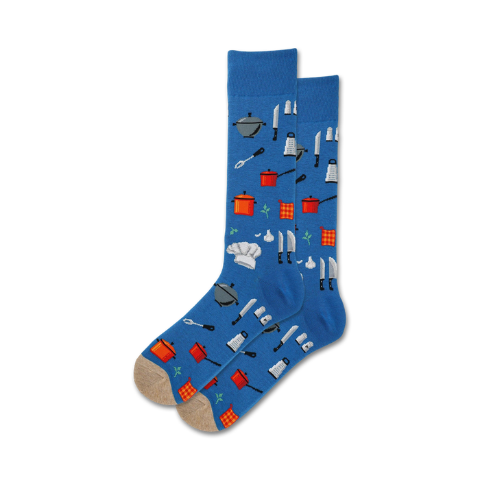Pair of crew socks, blue and beige options shown, featuring a pattern of kitchen tools like pots, pans, knives, and a chef's hat.