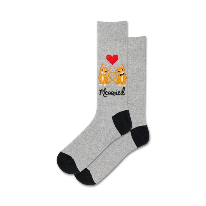 A pair of heather gray crew socks with an image of two orange cats forming a heart shape, a red heart above them, and the word 'Meowied' below.  Black heels and toes. }}