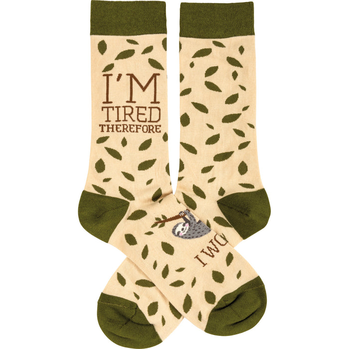 Cream-colored crew socks with olive green cuffs. Features a sleepy sloth and the phrase 'I'm Tired Therefore I Will'. }}