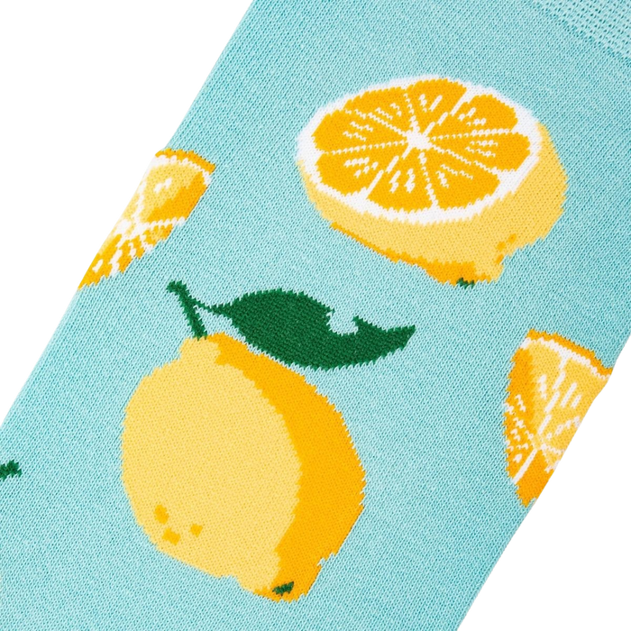 Close-up detail shot of a lemon sock, showcasing the lemon print.