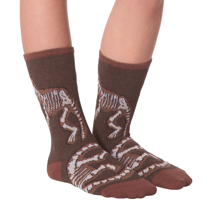 Another lifestyle shot of Dino Bones socks on a person's feet.