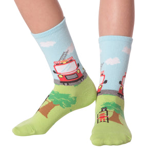 Lifestyle shot of Fireman socks on a person's feet, showing the full sock design.
