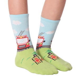Another lifestyle shot of Fireman socks on feet, showcasing the sock's fit and design.