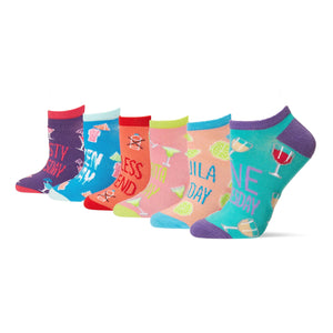 Lifestyle shot of six Happy Hour socks displayed from an angled view. Shows the socks' colors and design well.