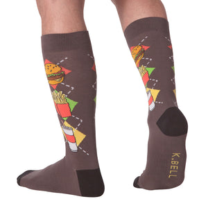 Back view of a person wearing the Junk Food socks, showcasing the full design on the leg.