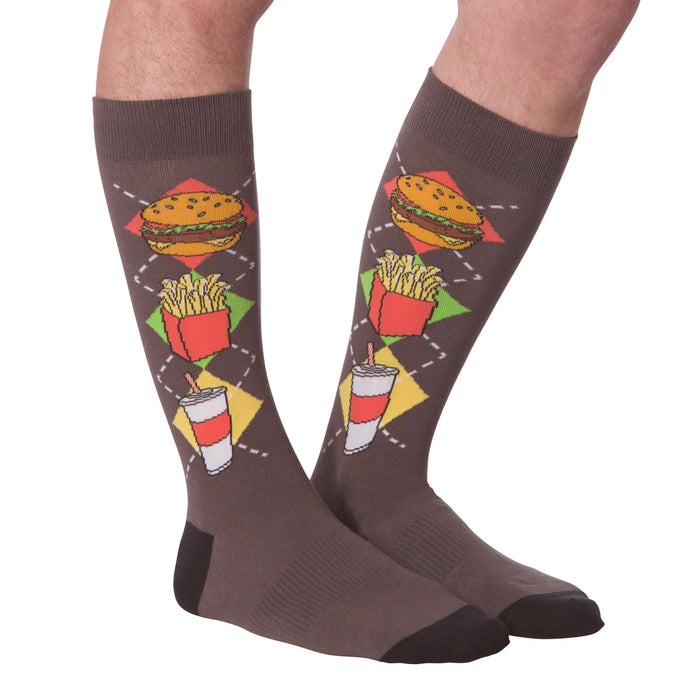 A flat lay image showing both Junk Food socks together, highlighting the details of the argyle pattern.