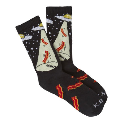 Crew socks, black with off-white and red bacon design, a flying saucer abducting a large piece of bacon against a starry background.