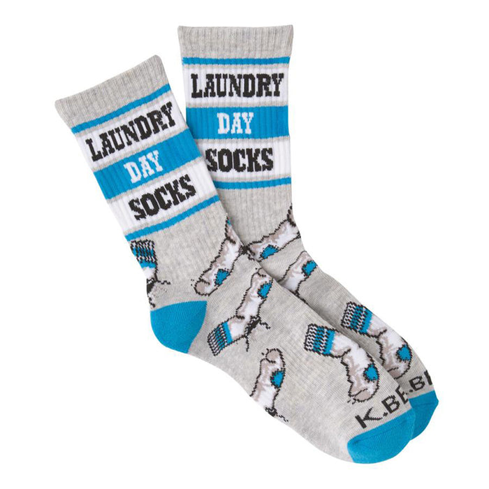 A pair of grey crew socks with teal accents. The socks have 'Laundry Day Socks' written on them and a pattern of small grey socks. }}