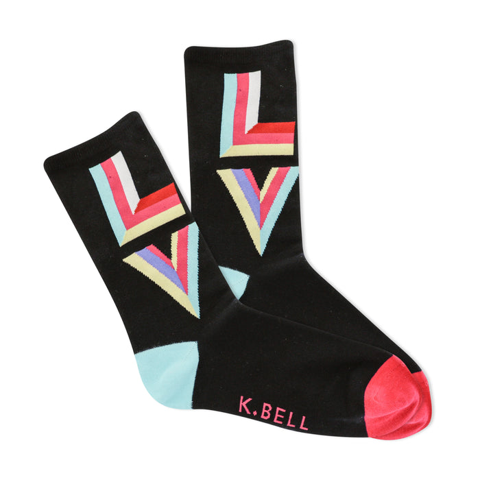 Black crew socks with a multi-colored geometric 'LOVE' pattern. Pastel pink, yellow, and blue stripes form the letters. Pink and teal accents are visible. }}