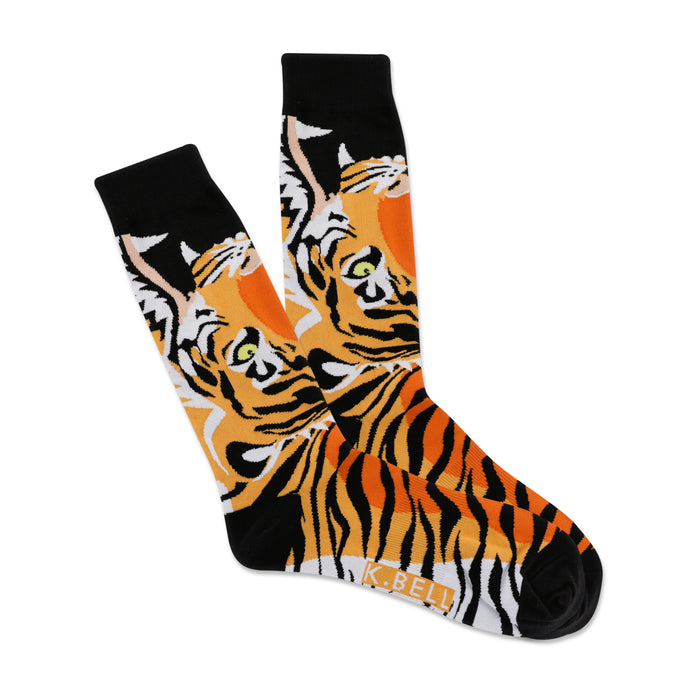 A pair of crew socks with a tiger face design. The tigers are predominantly orange and black with green eyes, set against a black background. }}