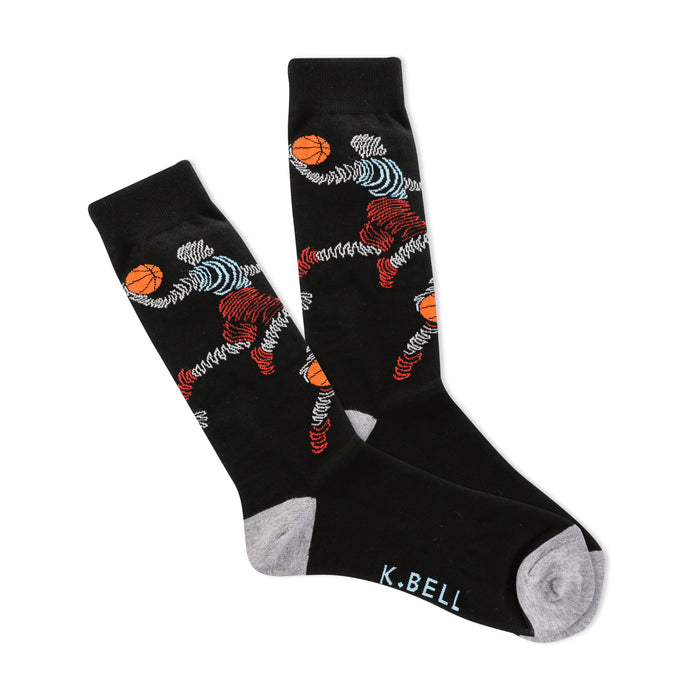 Pair of black crew socks with a zigzag pattern featuring stylized basketball players in red, orange, and light blue. Grey cuffs. }}