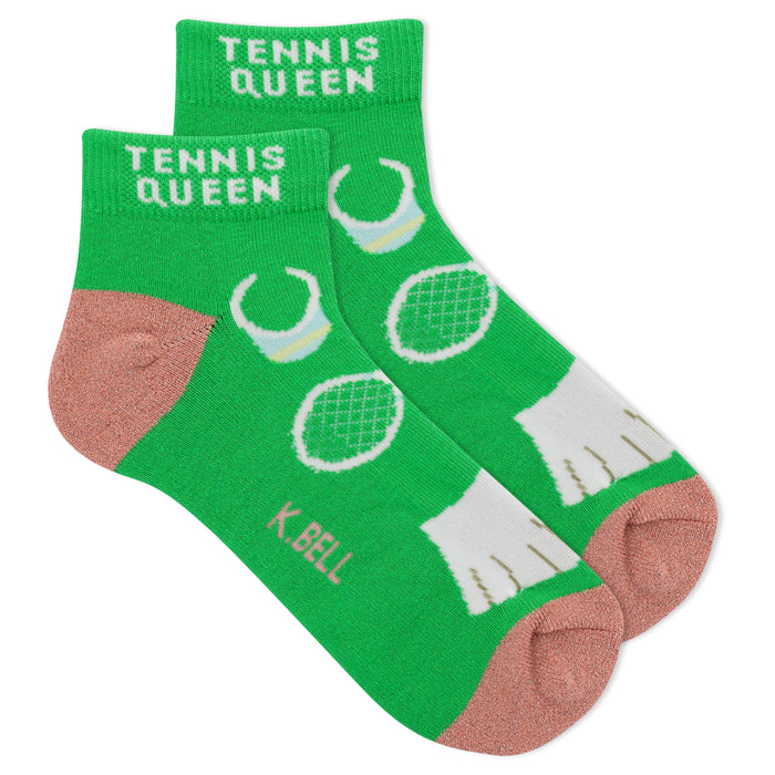 Pair of lime green ankle socks.  Features a tennis-themed pattern with white tennis rackets and balls. Pinkish-peach heel and toe. }}