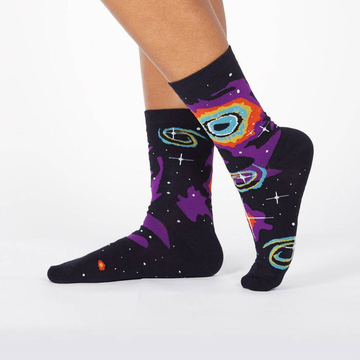Lifestyle shot showing Helix Nebula socks on a person's legs.
