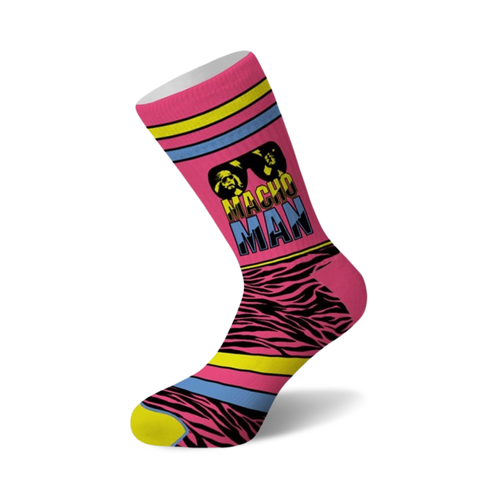Crew socks in pink with a black zebra stripe pattern, featuring a graphic of Randy Savage and the words 'Macho Man'. }}