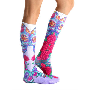 Lifestyle shot showing Dia socks on a person's legs from the side.