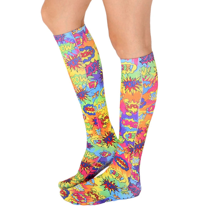 Pair of Tie Dye Pop Art knee-high socks shown from the side on a white background.