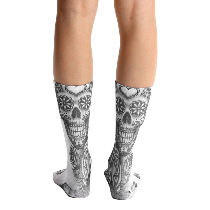 Back view of Dia socks showcasing the full sugar skull design.
