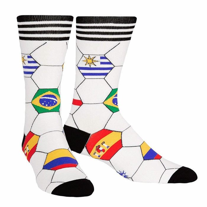 A pair of crew socks with a white soccer ball design. National flags from various countries are featured in the hexagons. Black and white stripes at the top. }}
