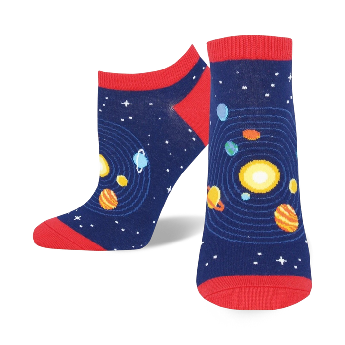 A pair of navy blue ankle socks with a red cuff. The socks feature a colorful solar system pattern with planets orbiting a yellow sun. }}