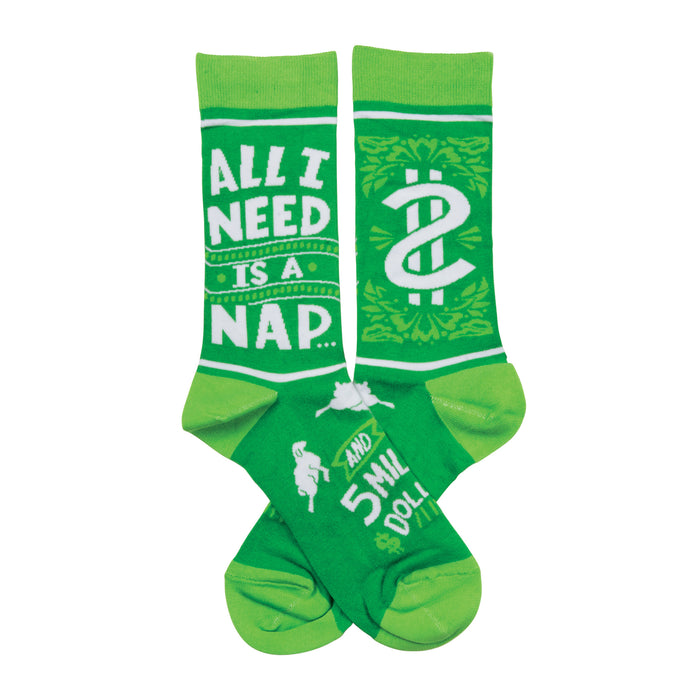 Crew socks, bright and lime green. One sock says 'All I Need Is A Nap,' the other has a dollar sign graphic and small sleeping figure. }}