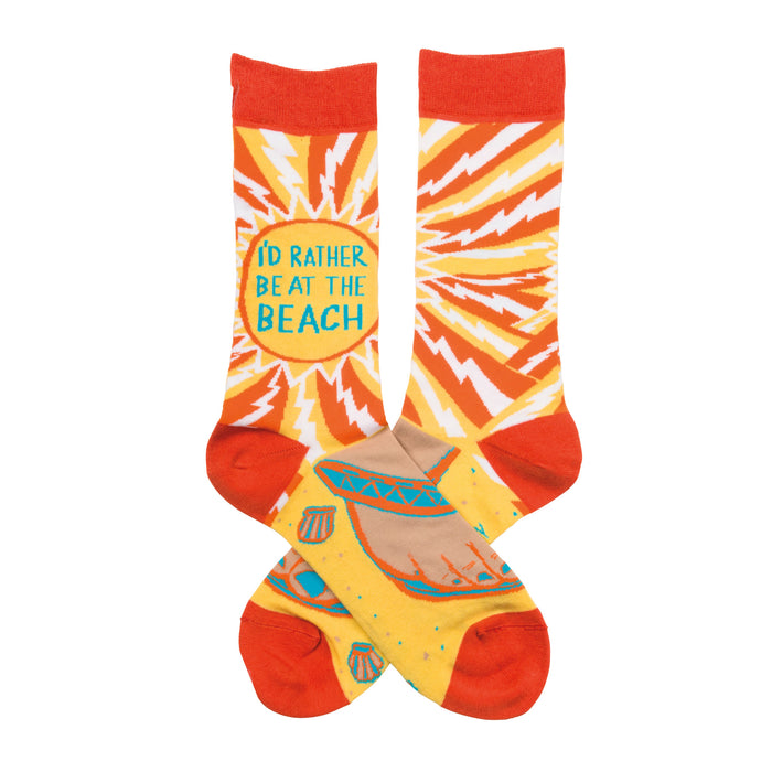 Crew socks in orange and yellow.  One features 'I'd rather be at the beach' surrounded by a lightning bolt pattern. The other shows a beach scene with seashells. }}
