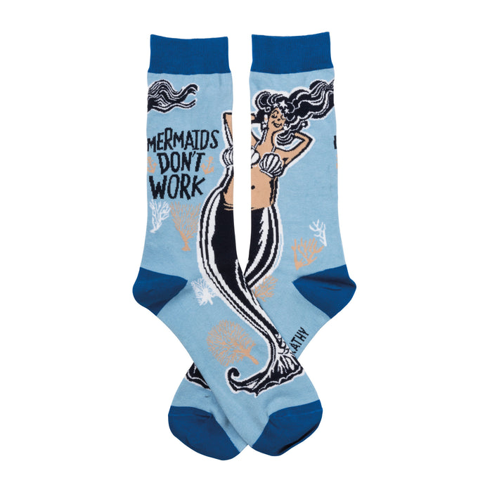 Crew socks in light blue with a dark blue cuff. Feature a graphic of a mermaid with the text 'Mermaids Don't Work'. }}