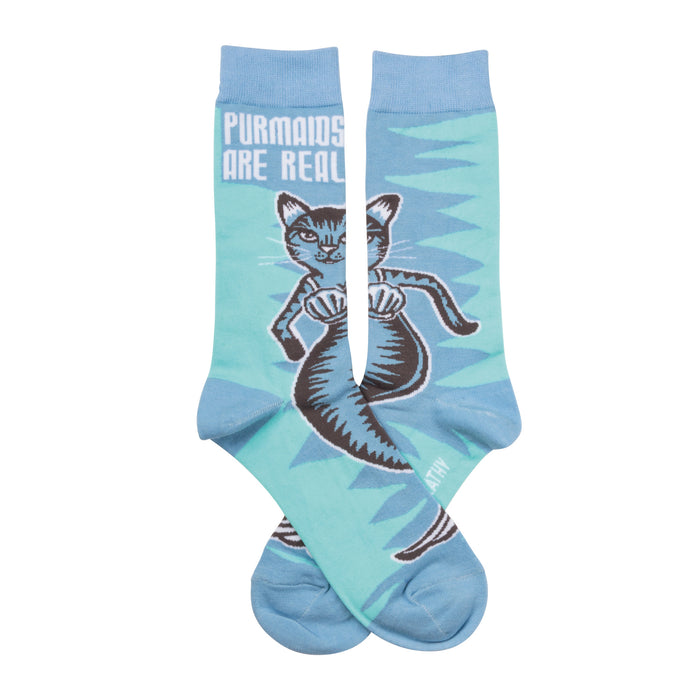 Crew socks featuring a teal blue background, a striped cat-mermaid design, and the text 'Purmaids are real'. }}