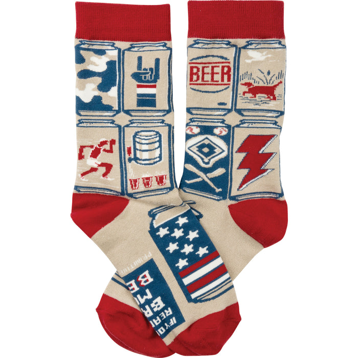 Crew socks in beige with red cuffs.  The design is a repeating pattern of illustrated beer cans with various images: a dog, a lightning bolt, baseball equipment, etc. in red, white, and blue. }}