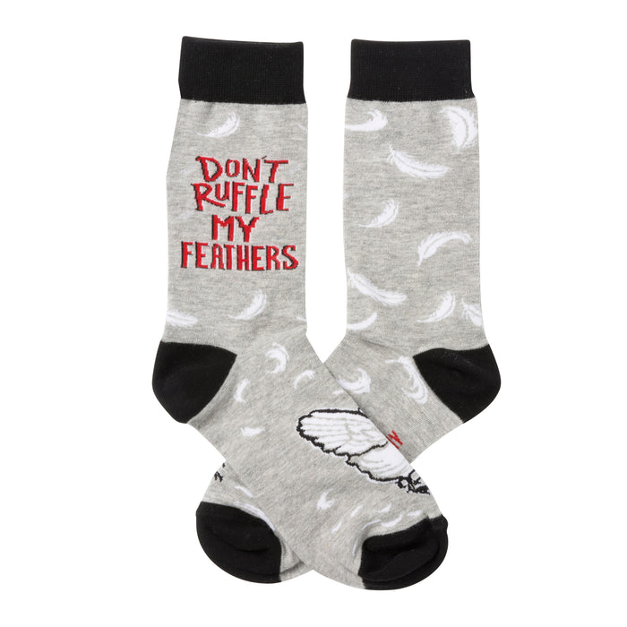 A pair of grey crew socks with a white feather pattern and 'Don't Ruffle My Feathers' in red lettering. The socks also feature a small bird graphic. }}