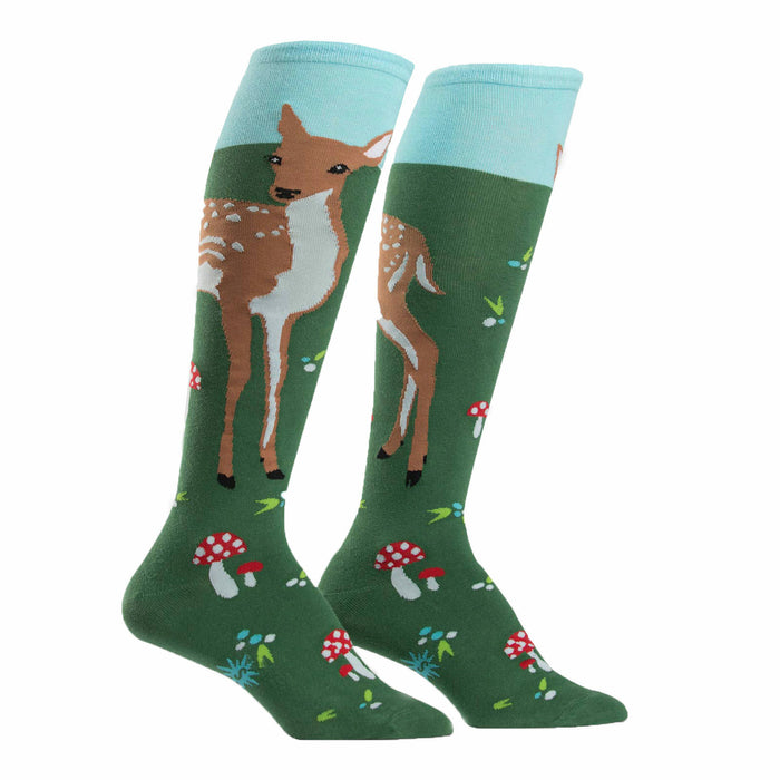 Pair of women's knee-high socks. Green background with illustrations of fawns, mushrooms, and light blue cuff. }}