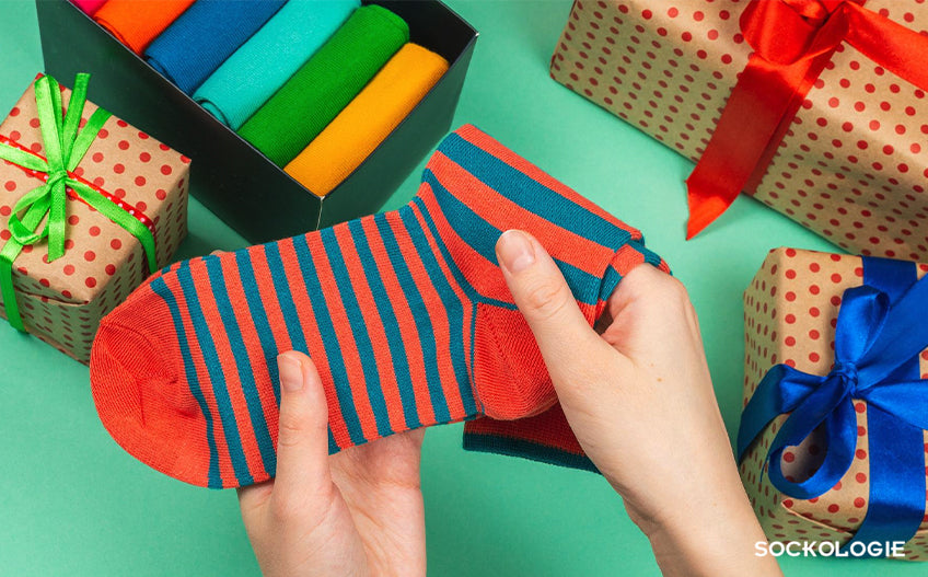 A person getting socks for Christmas