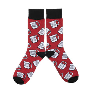 A pair of red socks with a pattern of white coffee mugs that say 