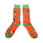 Close-up of a pair of orange crew socks showcasing characters and text from Green Eggs and Ham.