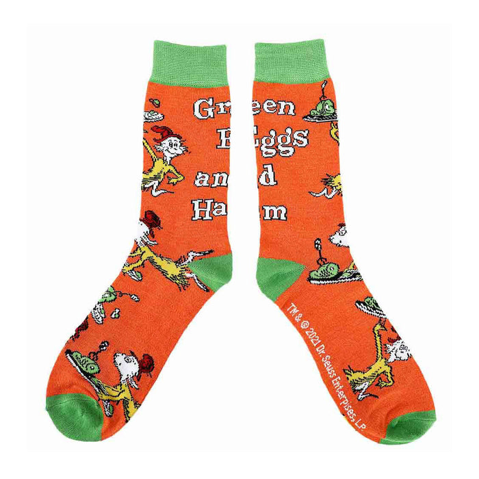 A pair of orange socks with the words 