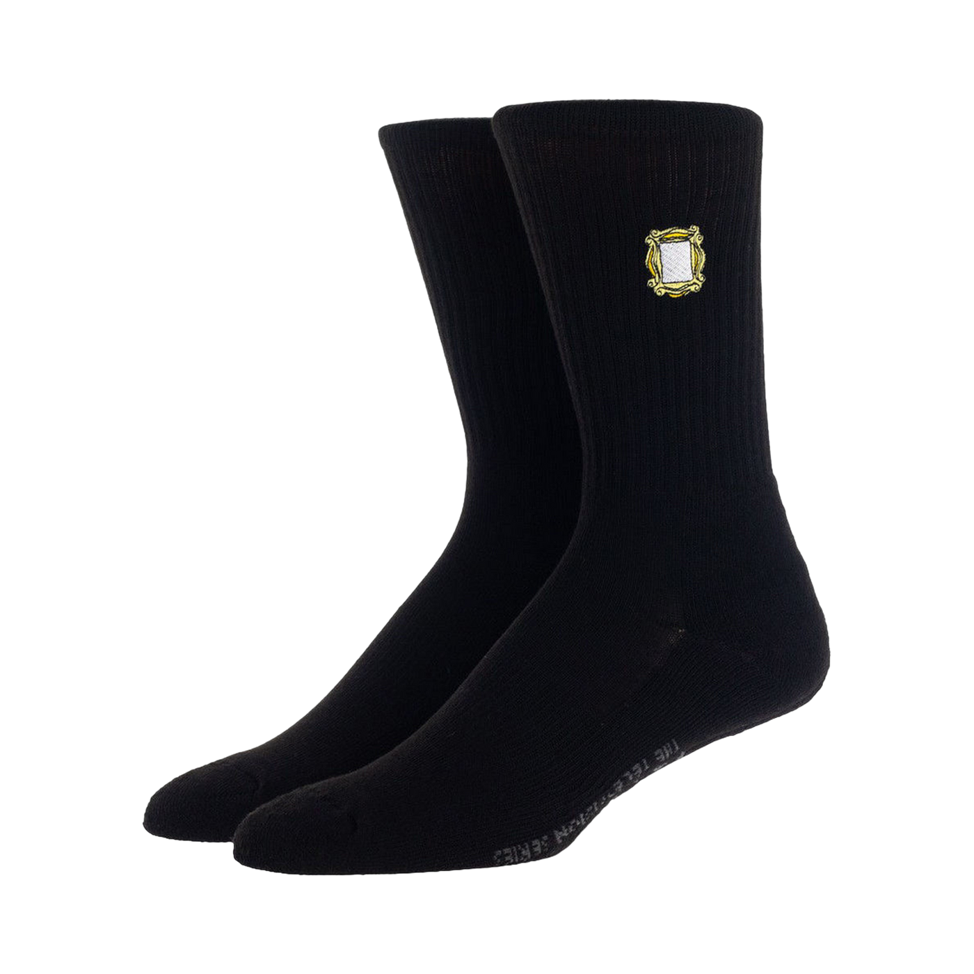 Close-up shot: A single pair of black Friends socks, highlighting the detail of the embroidered coffee cup design.