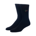 Close-up of a pair of black crew socks with the Schrute Farms logo embroidered on them.