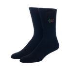 Close-up of a pair of black crew socks with the Schrute Farms logo embroidered on them.