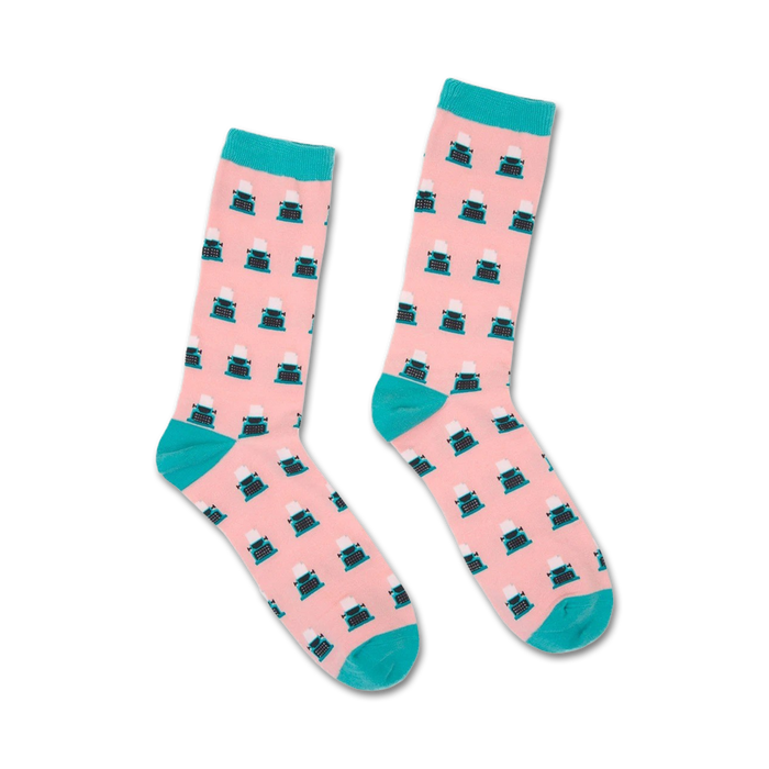 pink crew socks boast blue typewriter pattern with white keys and black roller. made for men and women.  